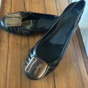 Black Flats from Ferragamo  with Gold Bow Accent size 8
